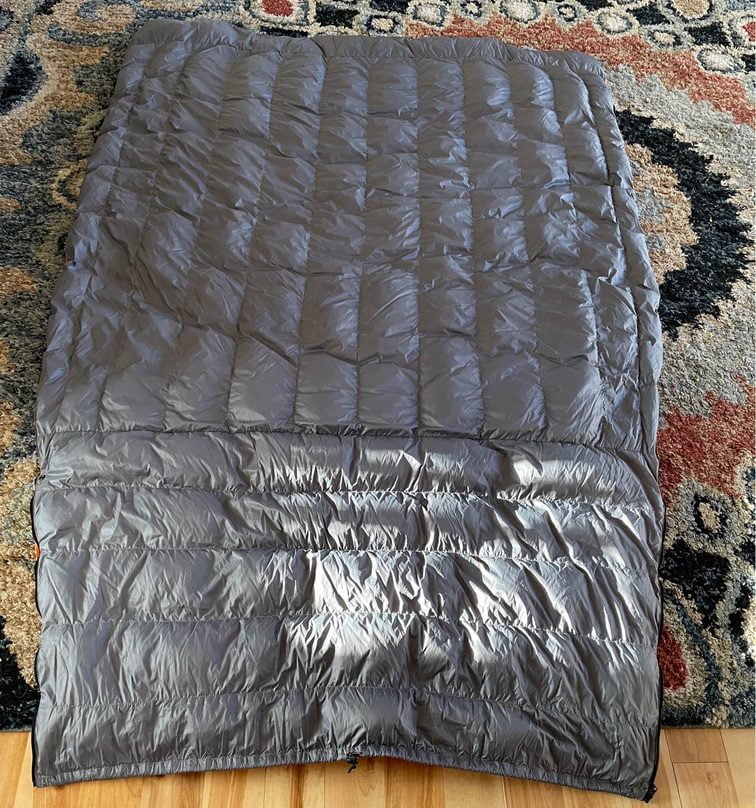 Burrow 20 degree quilt fully opened up into a rectangle